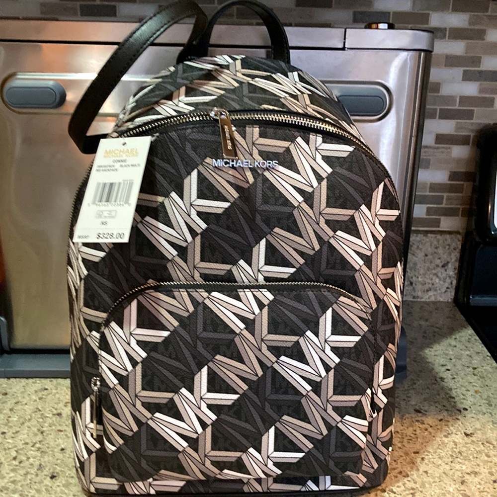 Michael Kors Backpack (NEW) 14”x12” black/tan/cream/gray. Silver hardware